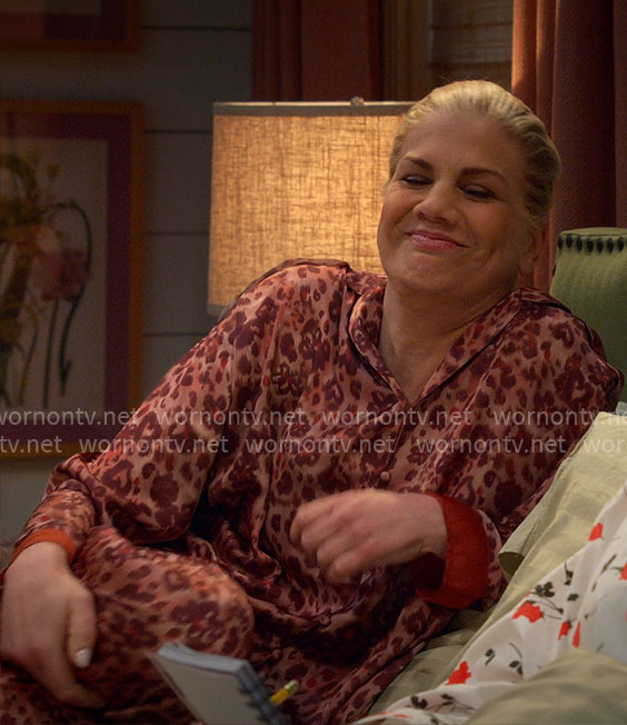 Carol’s orange leopard print pajamas on Leanne