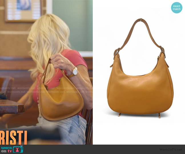 Coach Leather Shoulder bag worn by Kristi McBee on The McBee Dynasty Real American Cowboys