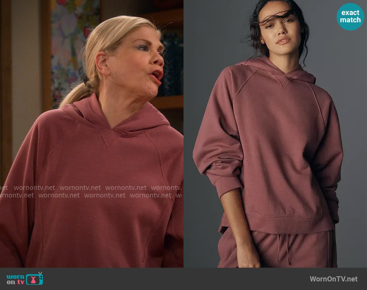 Daily Practice Sparkle Pullover Hooded Sweater in Pink worn by Carol (Kristen Johnston) on Leanne