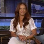 Elle Duncan’s white sheer stripe jumpsuit on Live with Kelly and Mark