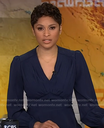 Jericka’s navy pleated v-neck dress on CBS Evening News