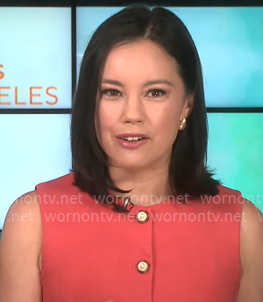 Jo Ling Kent’s orange button-front top on CBS Mornings