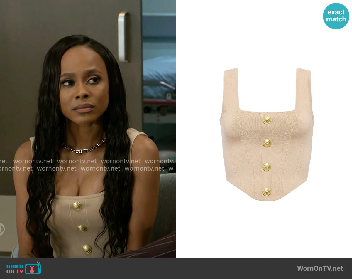 L'Agence Saga Compact-Knit Corset Top in Almond Gold worn by Hayley Lawson (Marquita Goings) on Beyond the Gates