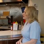 Lisa Rozner’s light blue polo dress on CBS Evening News