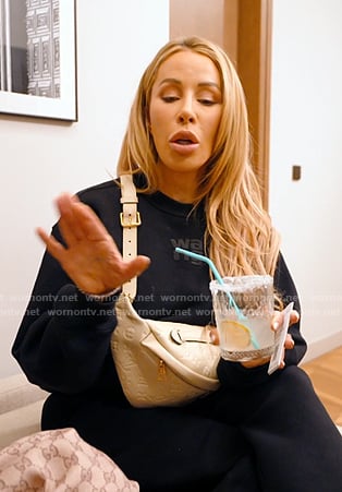 Lisa’s black sweatshirt and bag on The Real Housewives of Miami