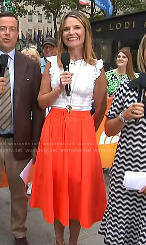Savannah’s white smocked top and orange skirt on Today