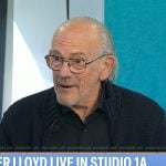 Christopher Lloyd’s navy zip sweater and leather sneakers on Today