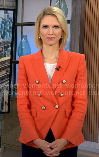Anna Schechter’s orange blazer on CBS Mornings