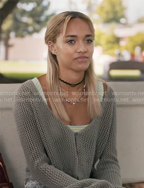 Ava’s striped tank top, crochet cardigan and snake print jeans on High Potential