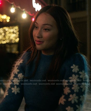 Belly’s blue sweater with floral sleeves on The Summer I Turned Pretty