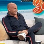 Billy Zane’s navy track jacket and pants on Access Hollywood