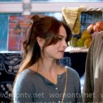 Cassandra’s blue cardigan on Murder in a Small Town