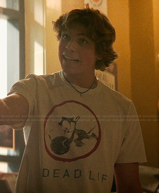 Charlie’s white graphic tee on The Runarounds