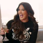 Emily’s black tiger graphic sweater on The Real Housewives of Orange County