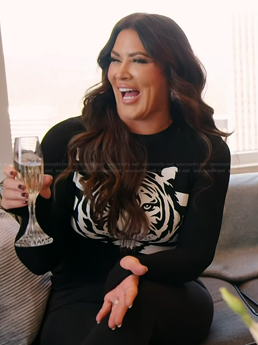 Emily’s black tiger graphic sweater on The Real Housewives of Orange County