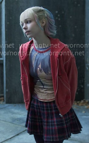 Enid’s anime graphic tee and plaid skirt on Wednesday