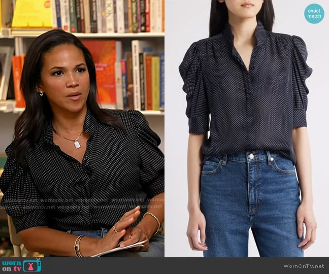 Frame The Gillian Puff Sleeve Silk Blouse in Navy worn by Laura Jarrett on Today