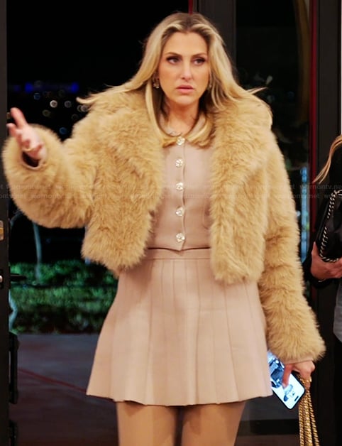 Gina’s pink cardigan and mini skirt on The Real Housewives of Orange County