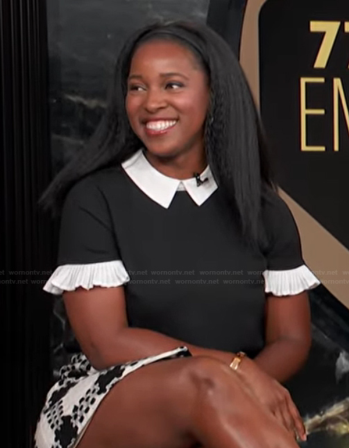 Janine’s black contrast top on E! News