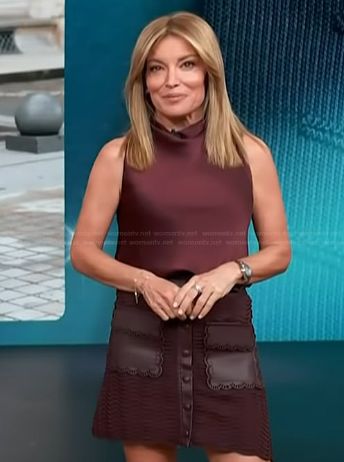Kit’s burgundy cowl neck top on Access Hollywood