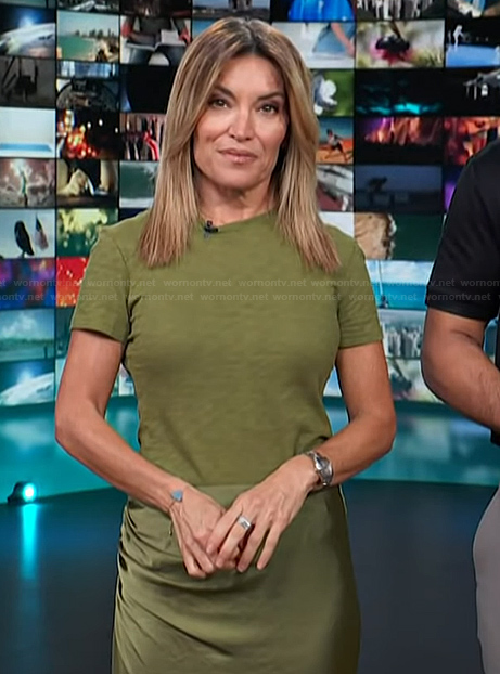 Kit’s green tee and satin skirt on Access Hollywood