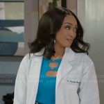 Madison’s blue cutout top on Beyond the Gates