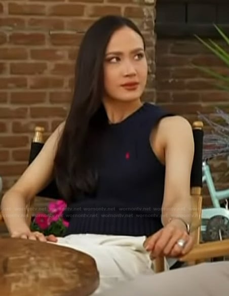 Madison Chock’s navy vest on Access Hollywood