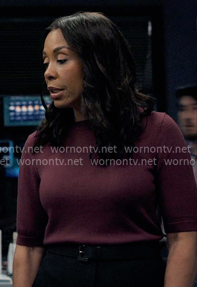 Mia’s purple short-sleeve sweater on The Morning Show