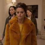 Mabel’s orange fur jacket and plaid pants on Only Murders in the Building