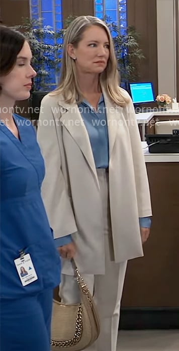 Nina’s cream coat and blue blouse on General Hospital