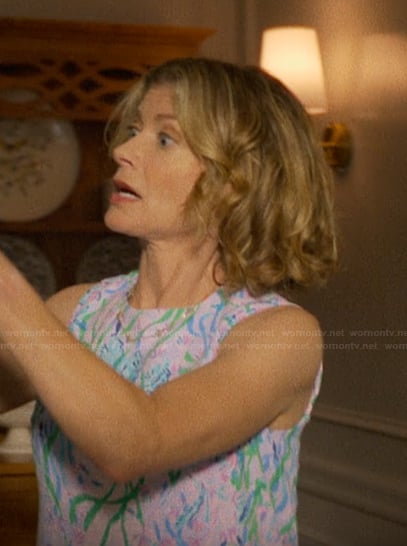 Nora’s blue floral print dress on The Runarounds