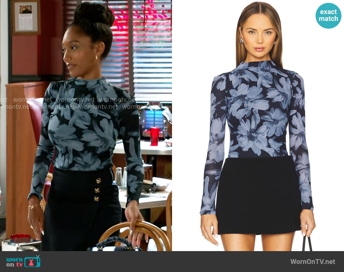 Rails Joelle Top in Midnight Lily worn by Samantha Richardson (Najah Jackson) on Beyond the Gates