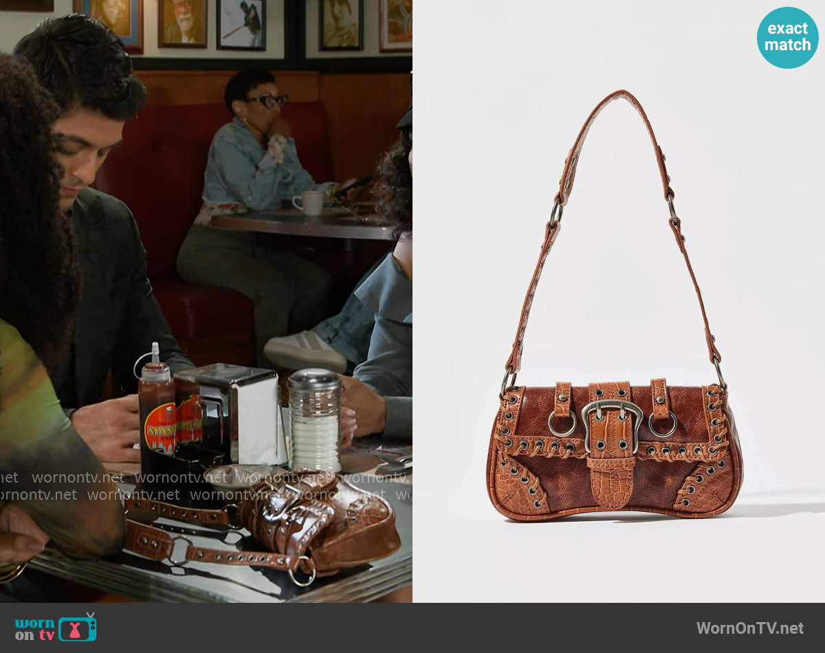 Silence + Noise Jade Laced Rivet Bag worn by Eva Thomas (Ambyr Michelle) on Beyond the Gates