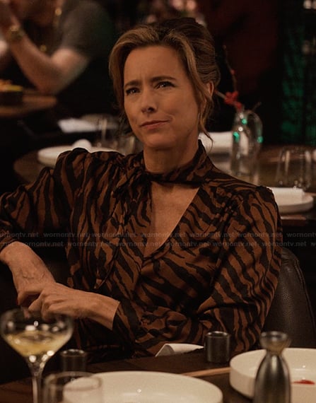 Sofia’s animal print tie neck blouse on Only Murders in the Building