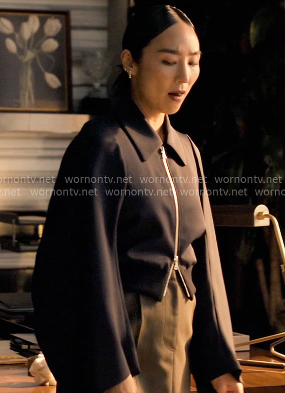 Stella’s navy flared sleeve jacket on The Morning Show