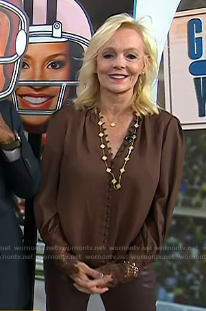 Tammy Bradshaw’s brown lace-cuff blouse on Today