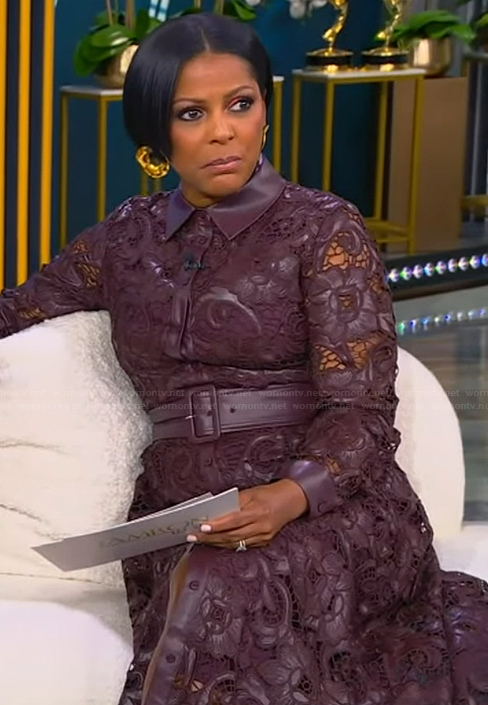 Tamron’s burgundy leather trim lace dress on Tamron Hall Show
