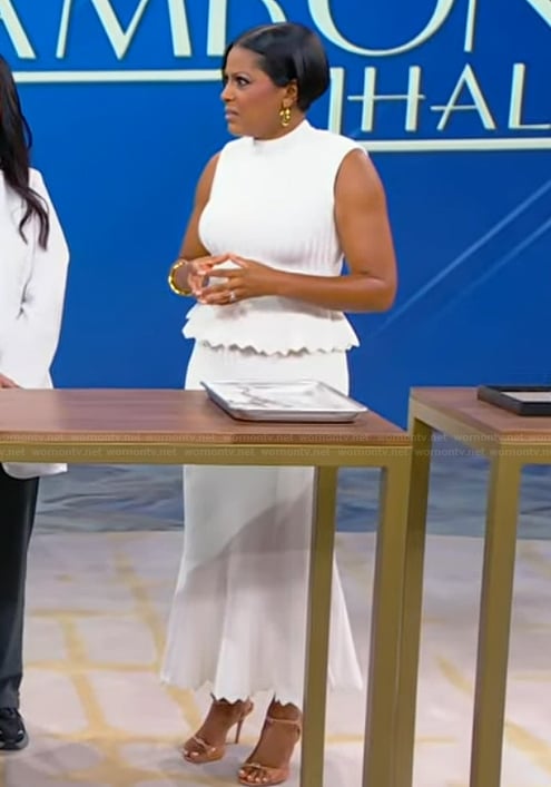 Tamron’s white peplum top and skirt on Tamron Hall Show