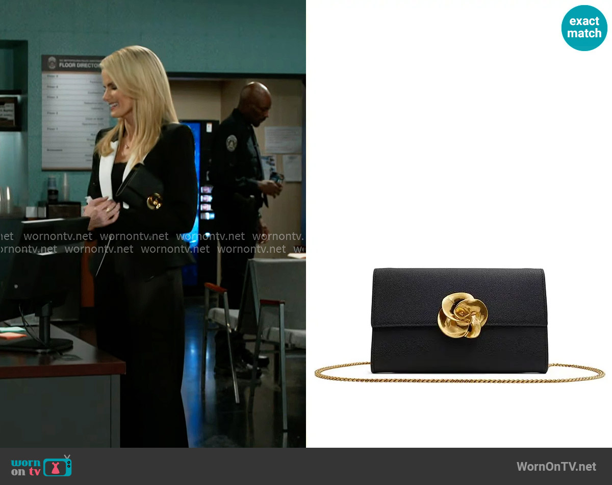 Ted Baker Kira Rose Clutch worn by Vanessa McBride (Lauren Buglioli) on Beyond the Gates
