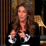 Alyssa’s black contrasting ruffle trim dress on The View