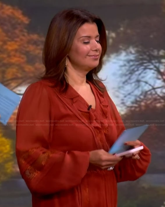 Ana’s orange ruffle dress on The View