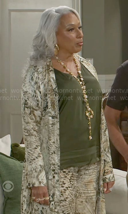 Anita’s snake print jacket and pants set on Beyond the Gates