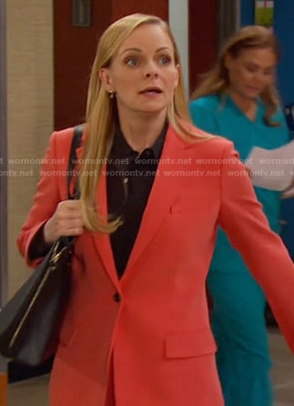 Belle’s orange blazer and pant suit on Days of our Lives