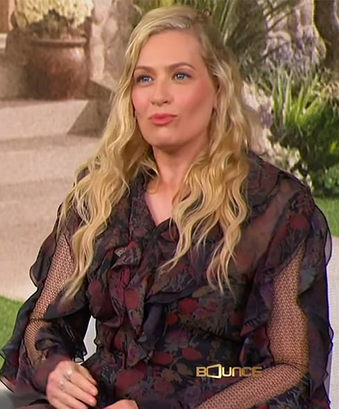 Beth Behrs’ black floral print ruffle dress on The Jennifer Hudson Show
