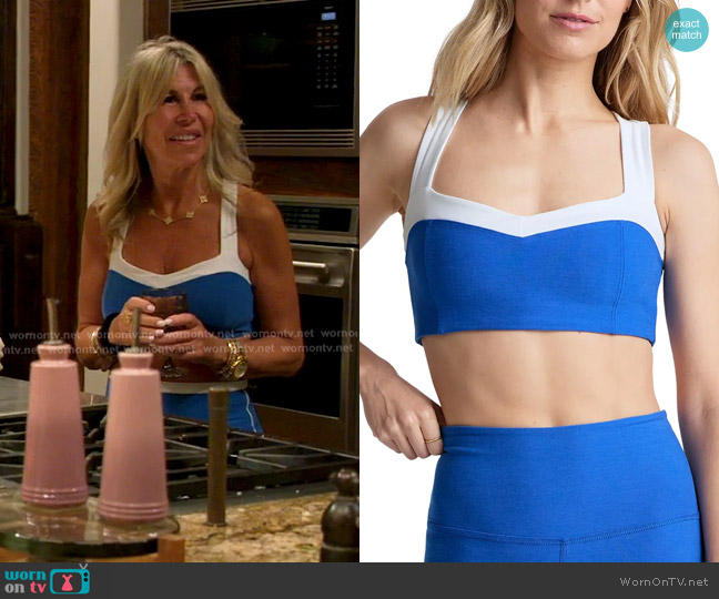 Beyond Yoga Space Dye Colorblock Sports Bra in Court Blue Heather/Cloud worn by Amy Kaplan on The Golden Bachelor