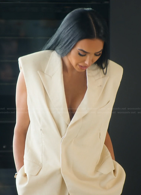 Bre’s ivory padded shoulder vest on Selling Sunset