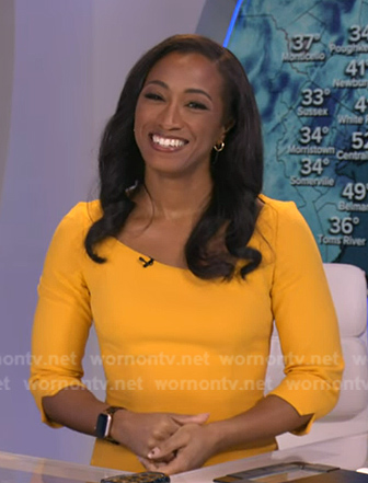 Brittany Bell’s yellow asymmetric neck dress on Good Morning America