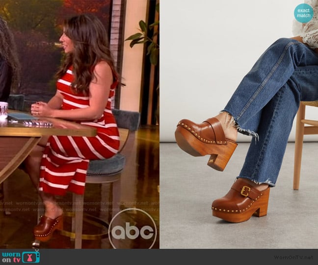 Chloe Jeanette studded platform clogs worn by Alyssa Farah Griffin on The View