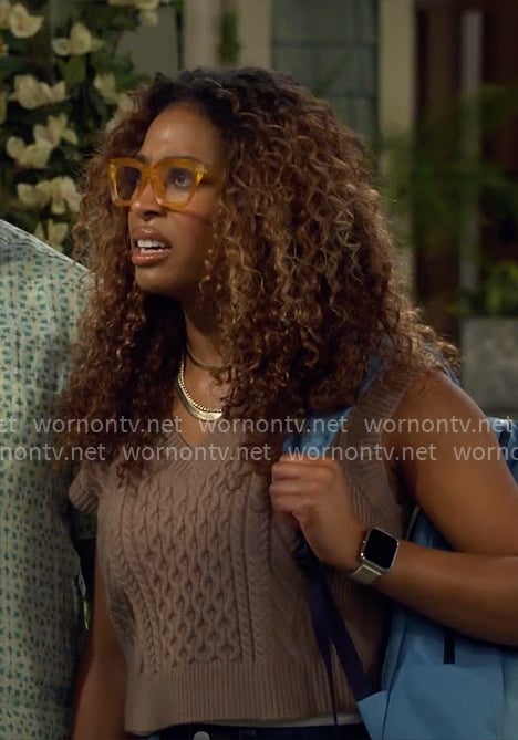 Courtney’s brown cable knit sweater vest on The Neighborhood