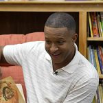 Craig Melvin’s white striped polo on Today